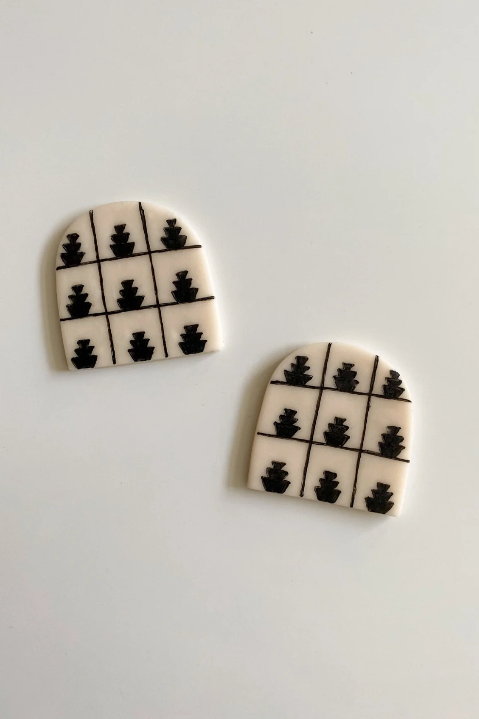 Caid Earrings
